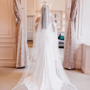 View this stunning Athena - L veil with Arianna trim on the hem. Click to shop our amazing range of veils.