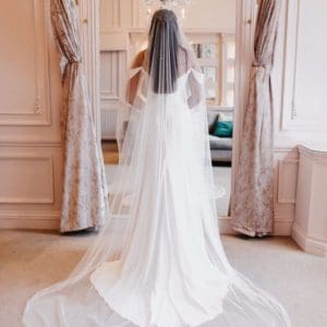 The Aurelia veil on smooth Italian Tulle with a scattering of different size Swarovski Hot Fix Pearls is available now. Click to shop.