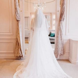 This 2 tier italian tulle has Bianca Lace from the fingertip down all around the hem. Click to shop our gorgeous veils.