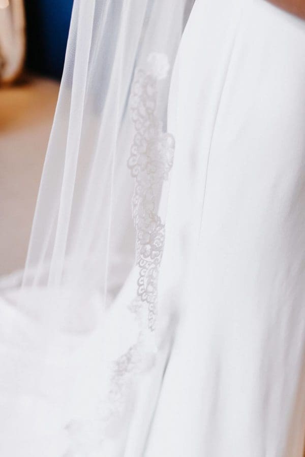 This beautiful single tier vintage tulle with Camilla Edging to the Fingertip veil would look stunning on any bride. Click to shop.