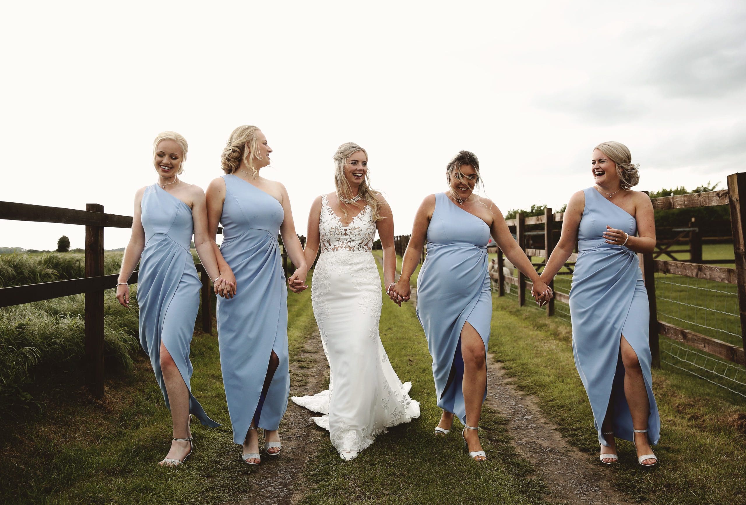 Emily chose the Malia by Blue By Enzoani wedding dress for her big day